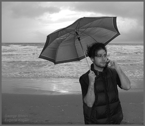  on the phone on the beach