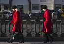 Two ladies in red